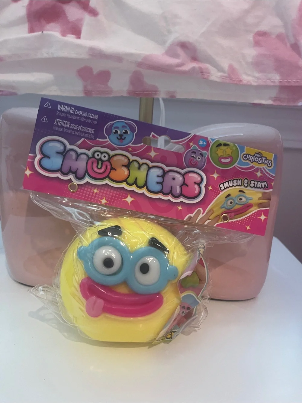 Smusher Yellow Smushers Emoji Squeeze Toy with Blue Eyes and Pink Mouth